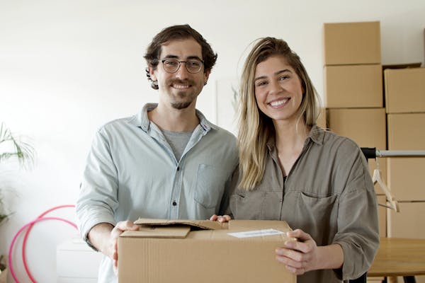 Happy couple with package